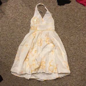 white and yellow dress